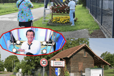 😱 DU JAMAIS VU ! Un maire, candidat aux “12 coups de midi”, fait un pari fou avec Jean-Luc Reichmann en direct. De retour chez lui, il commet l’irréparable : il DÉCROCHE le panneau d’entrée de son village et l’envoie par la poste ! La réaction de l’animateur en découvrant le colis est juste incroyable. L’histoire complète de ce geste fou en commentaire ! 👇